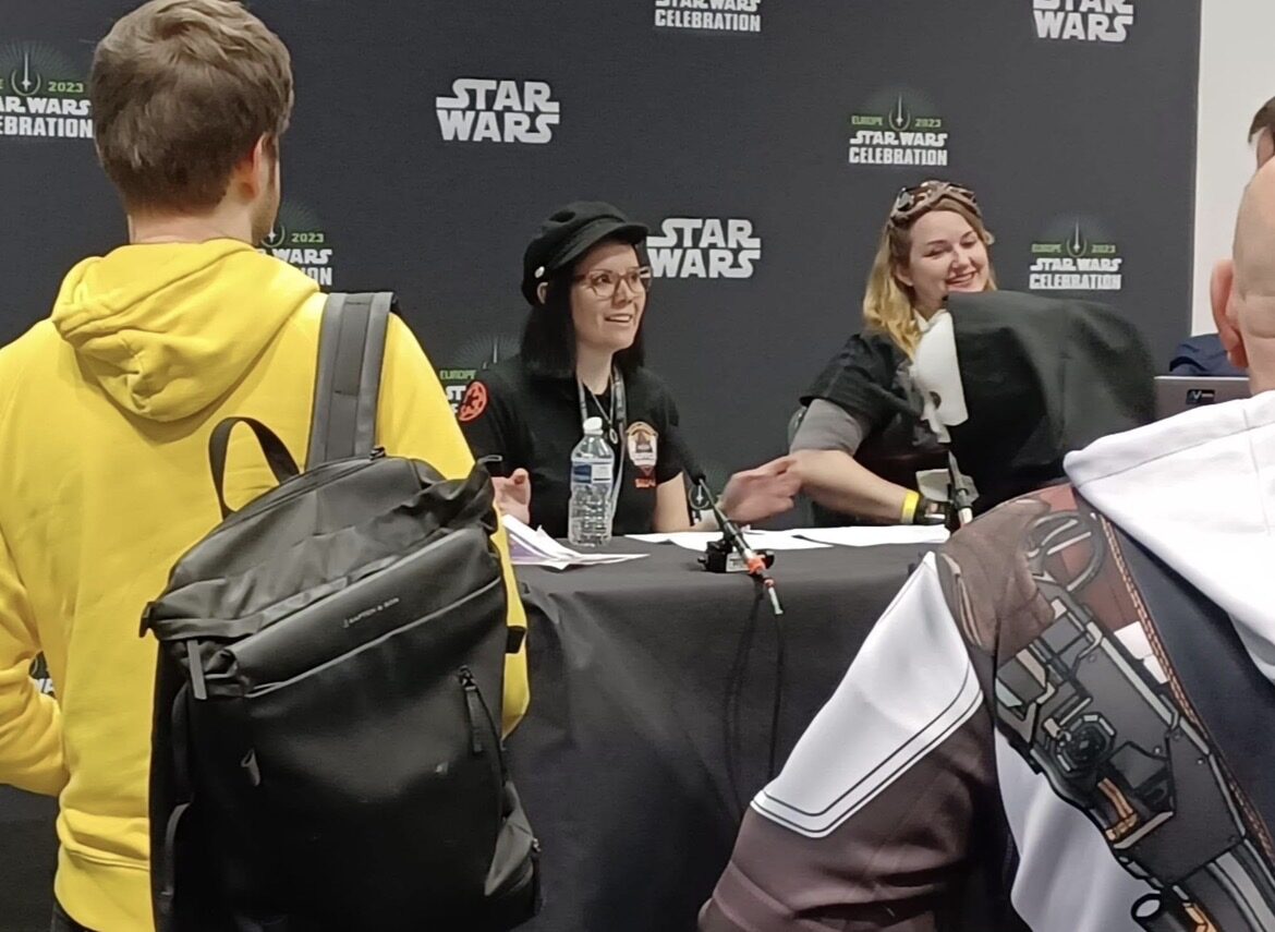 R.A. Avalon seated at the Old Republic panel table, talking with fans at Star Wars Celebration Europe 2023.