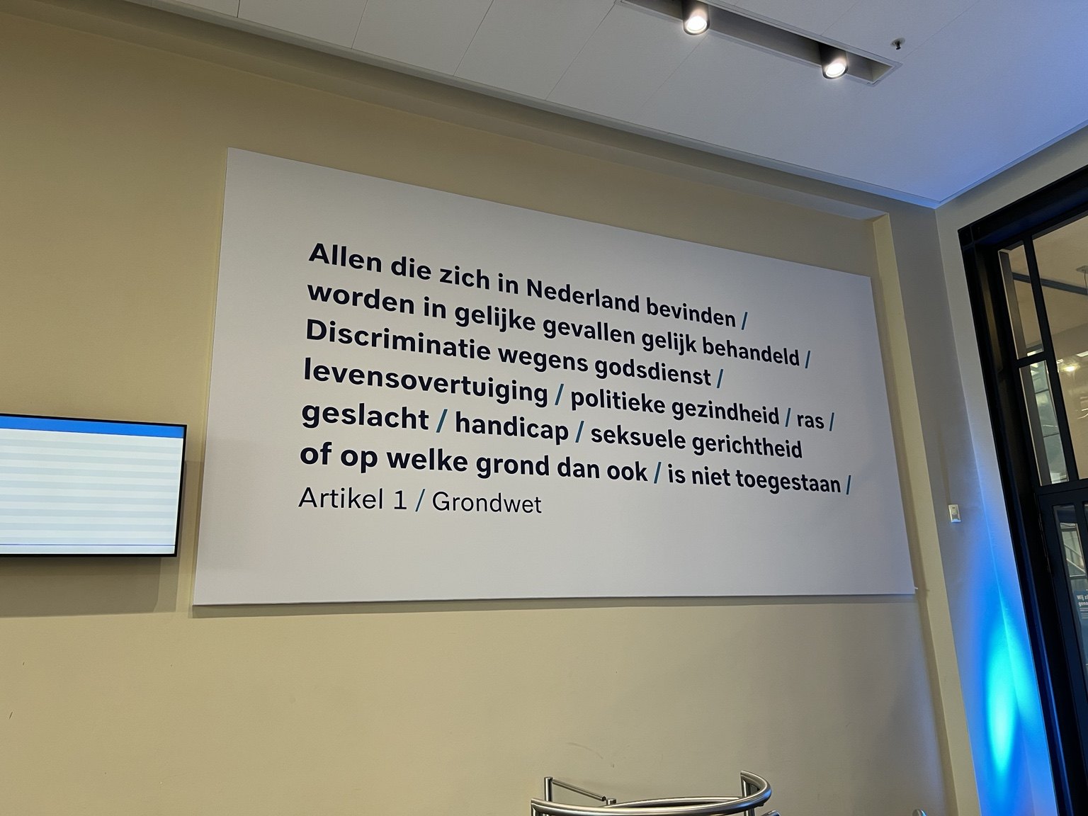 A wall display of Article 1 of the Dutch Constitution inside the Police Academy in Apeldoorn.
